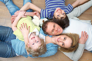 Young family considering term life insurance coverage.